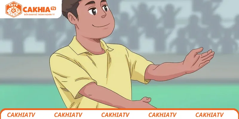 Trọng tài ra hiệu phép lợi thế trong bóng đá với tín hiệu play on